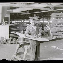 Shaving down propeller. Curtiss, Buffalo NY.