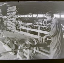 Putting hub on motor in Curtiss aircraft factory. Buffalo, NY.
