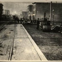 Men paving a street parallel to streetcar tracks, San Francisco, n.d.