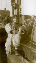 Woman in a hard hat diving suit