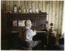 Chester Neill playing a piano