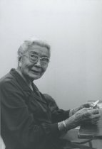 Emma Williams teaching moccasin making at THC