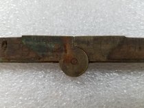 Double-sided wood and metal folding ruler