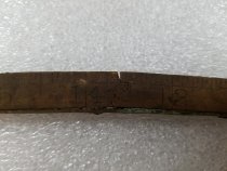 Double-sided wood and metal folding ruler