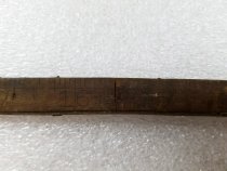 Double-sided wood and metal folding ruler