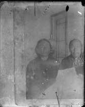 Man and woman seated