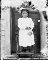Girl in front of door