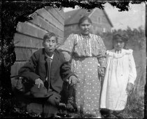 Family outside by building