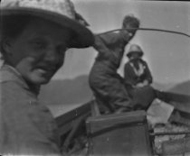 Flora Hillard and others in a boat