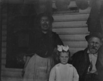 Woman, child and older man