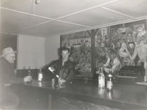 Bartender Clifford "Cookie" Homan and customer