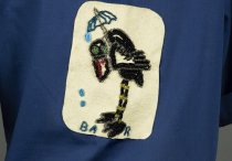 Beaded team design on shirt back