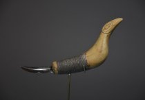 Crooked knife with raven on handle