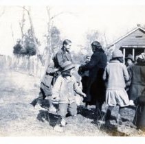 A group of natives. Mostly children