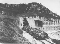 Visitors departing the Tavern of Tamalpais in a gravity car, 1916
