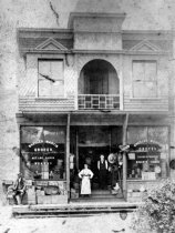 Wheeler Martin in front of his grocery store, 1890s