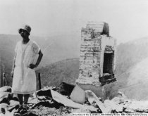 Lucille Frank Hughes at burned home on Middle Ridge,1929