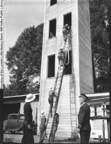 Civil Defense training for women for firefighting during World War II. 2/15