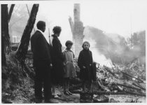Hermann family at remains of their residence, 1929
