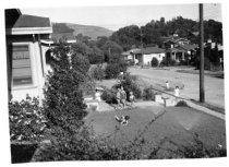 Children playing in front yard on Sunnyside Avenue, 1922