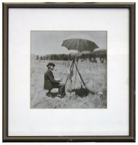 A portrait of Thaddeus Welch, seated at his easel, painting