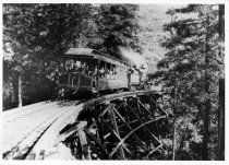 Mill Valley & Mt. Tamalpais Railroad train crossing trestle, circa early 19