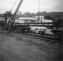 Removing the railroad tracks on Miller Ave., circa 1955