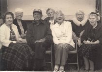 Group Seated Outdoors, 1985