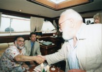 Francis Ford Coppola and Saul Zaentz shaking hands, 1998