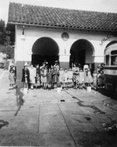 Mill Valley Girl Scout troup in front of the Mill Valley Depot, circa 1950