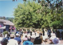 Halau Na Pua O Ka La Akea performing at the Mill Valley Depot Plaza, 1999