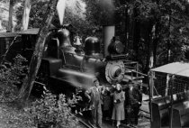 Engineer Johnson with mother and father-in-law, Mr. & Mrs. Madden, 1928