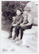 Two children sitting in front of the Mill Valley Public Library, Jan., 1919