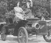 Antique Show, Lola Behr and friend in vintage Cadillac