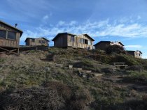 Steep Ravine Cabins seen from beach below, 2018