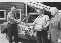 Lloyd Creemer, center, accepting State Fund plaque, date unknown