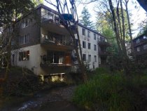 Mill Creek Apartments from creek, 2020