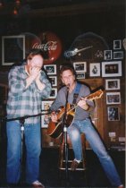 Bob Weir and harmonica player, date unknown