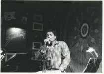 On stage, Aaron Neville singing, at Sweetwater