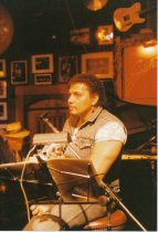 8 photos on stage at Sweetwater. One photo (image a) also shows Rob Wasserm