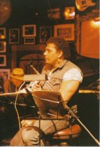 8 photos on stage at Sweetwater. One photo (image a) also shows Rob Wasserm