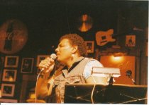 8 photos on stage at Sweetwater. One photo (image a) also shows Rob Wasserm