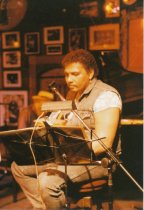 8 photos on stage at Sweetwater. One photo (image a) also shows Rob Wasserm