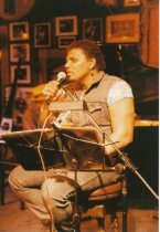 8 photos on stage at Sweetwater. One photo (image a) also shows Rob Wasserm