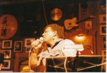 8 photos on stage at Sweetwater. One photo (image a) also shows Rob Wasserm