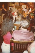 Three people on stage at Sweetwater