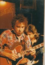 3 photos, Concert Hall West, 1987. 1 of Lorin Rowen of the Edge, and 2 of