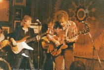 3 photos, Concert Hall West, 1987. 1 of Lorin Rowen of the Edge, and 2 of