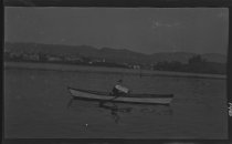 Lake Merritt, Raymond Coyne in a boat, circa 1918