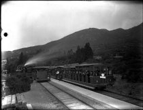 Busy scene at Bow Knot station with Locomotive #4, 1919